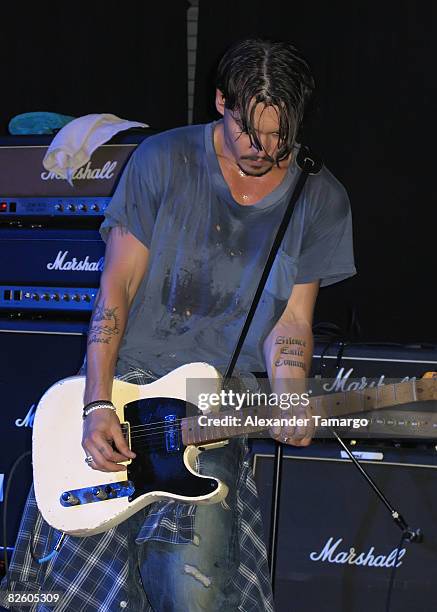 Johnny Depp performs with "The Kids" at Club Cinema on August 29, 2008 in Pompano Beach, Florida. .