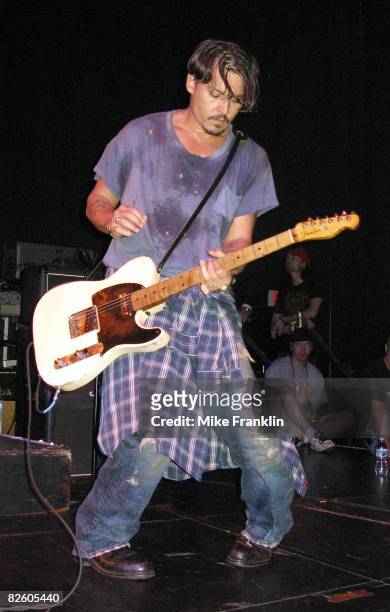 Johnny Depp performs live with his band The Kids as part of the Sheila Witkin Memorial Reunion Concert at Club Cinema on August 29, 2008 in Pompano...