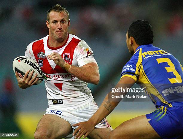 Mark Gasnier of the Dragons looks for a gap during the round 25 NRL match between the St George-Illawarra Dragons and the Parramatta Eels held at ANZ...