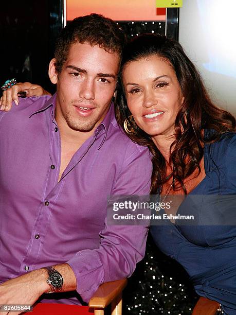Personality Nathan Fields and TV host Janice Dickinson pose during a model walk-off competition at the NBC Experience Store on August 25, 2008 in New...