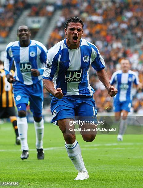 Amr Zaki of Wigan celebrates scoring during the Barclays Premier League match between Hull Ciy and Wigan Athletic at the KC Stadium on August 30,...