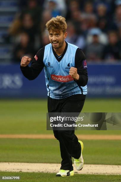 Will Beer of Sussex celebrates taking the wicket of Moises Henriques of Surrey during the NatWest T20 Blast match between Sussex Sharks and Surrey at...