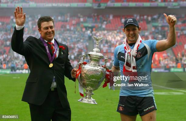 St Helens coach Daniel Anderson and Paul Wellens celebrate after winning the Carnegie Challenge Cup Final between Hull FC and St Helens at Wembley...