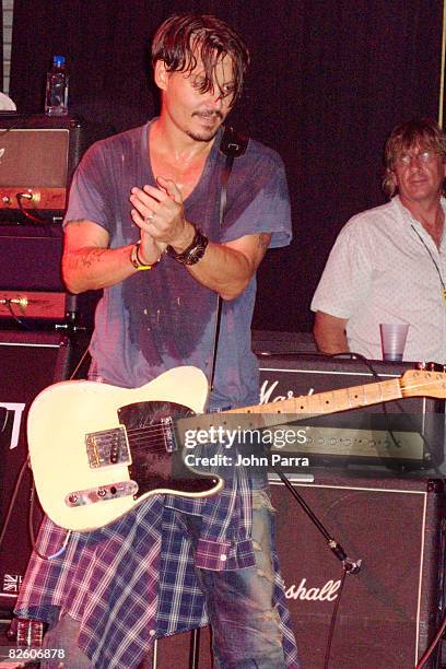 Johnny Depp performs with his band The Kids at the Sheila Witkin Memorial Reunion Concert at Club Cinema on August 29, 2008 in Pompono Beach, Florida.