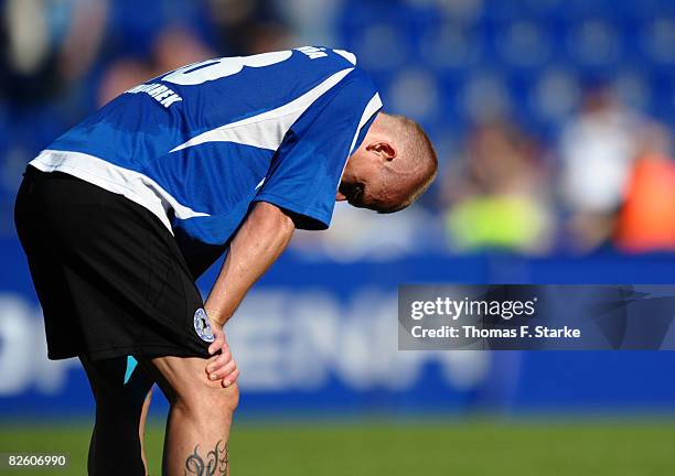 Artur Wichniarek of Bielefeld looks dejected after during the Bundesliga match between Arminia Bielefeld and Hamburger SV at the Schueco Arena on...