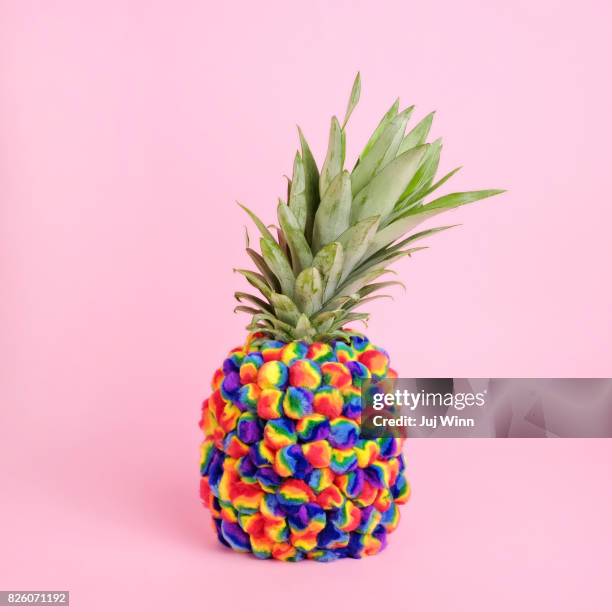 pineapple covered in tie-dye pompoms