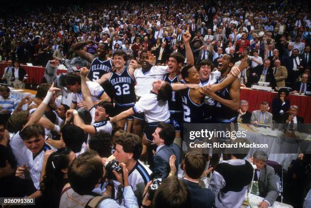 Playoffs: Villanova coach Rollie Massimino victorious being carried by players after winning game vs Georgetown. Lexington, KY 4/1/1985 CREDIT:...