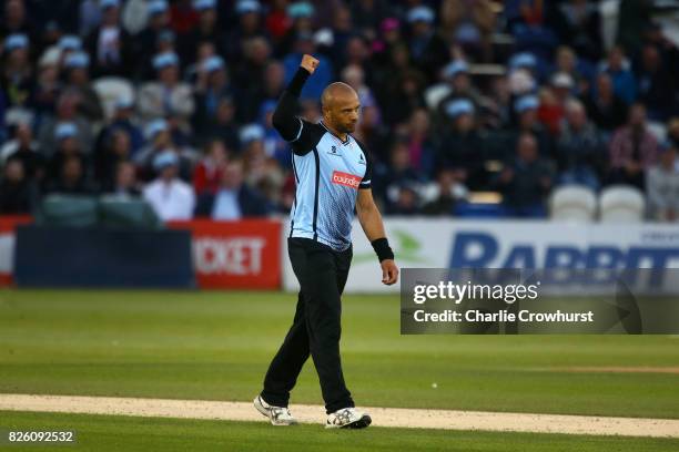 Tymal Mills of Sussex celebrates taking the wicket of Tom Curran of Surrey during the NatWest T20 Blast match between Sussex Sharks and Surrey at The...