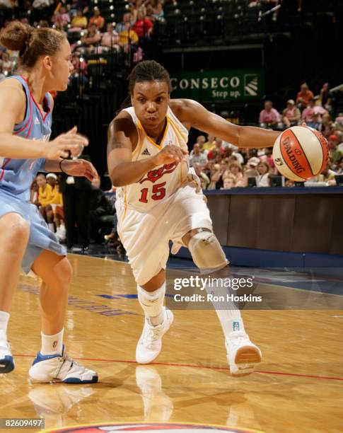 Tan White of the Indiana Fever drives on Kristin Haynie of the Atlanta Dream at Conseco Fieldhouse on August 30, 2008 in Indianapolis, Indiana. NOTE...