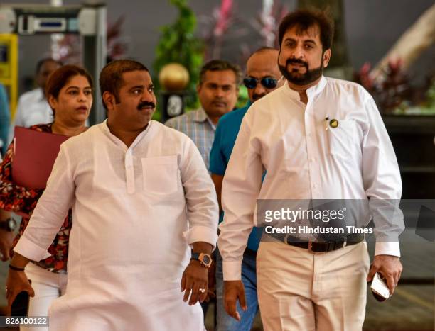 Ram Kadam and MIM MLA Sayed Imtiyaz Jaleel arrive at Vidhan Bhavan for Monsoon Assembly Session on August 2, 2017 in Mumbai, India.