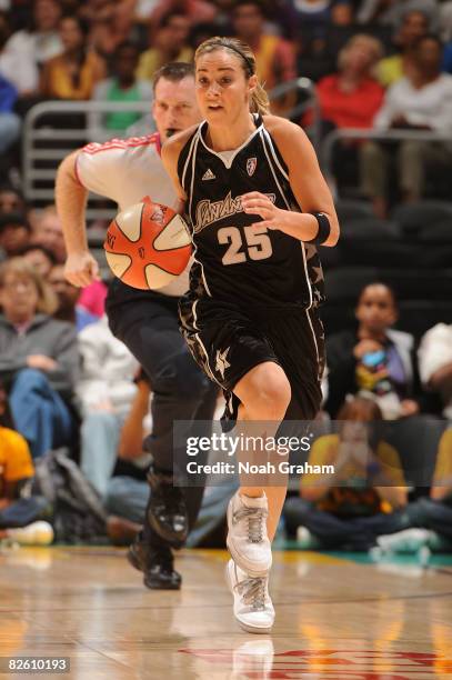 Becky Hammon of the San Antonio Stars drives the ball against the Los Angeles Sparks during the game at Staples Center on August 30, 2008 in Los...