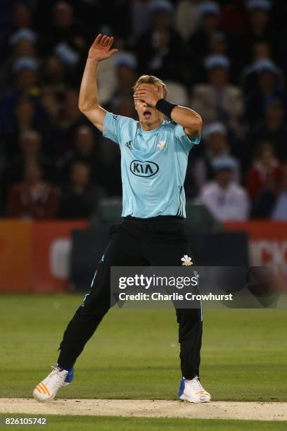 Surrey's Tom Curran reacts during the NatWest T20 Blast match between Sussex Sharks and Surrey at The 1st Central County Ground on August 3, 2017 in...
