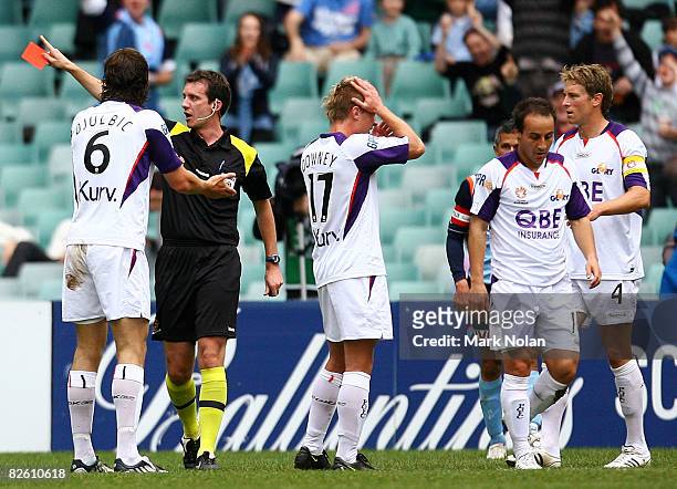 Dino Djulbic of Perth is shown the red card by referee Peter Green during the round three A-League match between Sydney FC and the Perth Glory at...