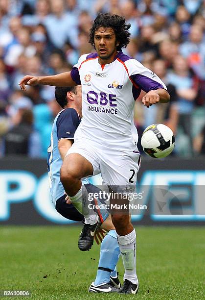 Nikolai Topor-Stanley of Perth beats a tackle during the round three A-League match between Sydney FC and the Perth Glory at Sydney Football Stadium...