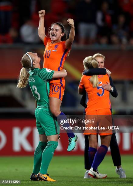 Danielle van de Donk of The Netherlands celebrates with team mate Loes Geurts after winning the UEFA Women's Euro 2017 Semi Final match between...