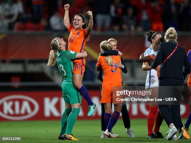 Danielle van de Donk of The Netherlands celebrates with team mate Loes Geurts after winning the UEFA Women's Euro 2017 Semi Final match between...