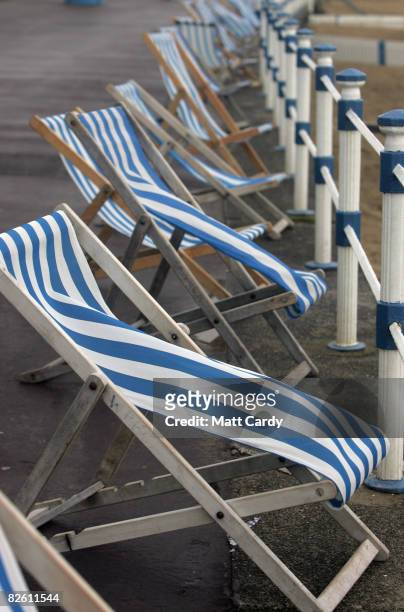 Empty deckchairs remain unused at Weymouth seafront on August 31 2008 in Weymouth, England. Forecasters have claimed that this August has been one of...