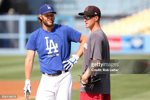 Clayton Kershaw of the Los Angeles Dodgers and Zack Greinke talk before the game against the Arizona Diamondbacks at Dodger Stadium on July 6, 2017...
