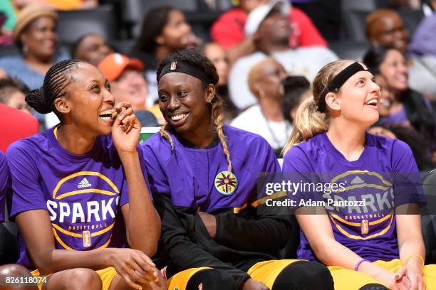 Sandrine Gruda, Essence Carson and Sydney Wiese of the Los Angeles Sparks look on during the game against the Dallas Wings on July 30, 2017 at...