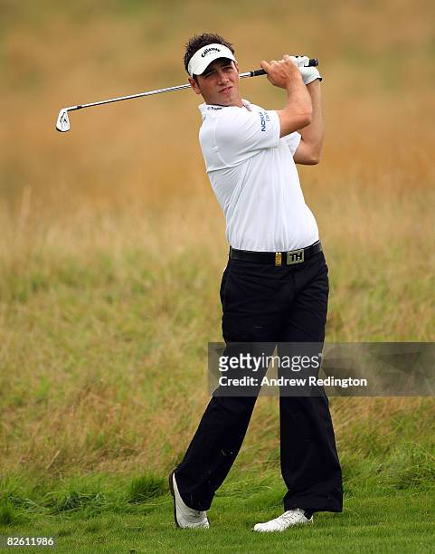 Nick Dougherty of England watches his second shot on the third hole during the final round of The Johnnie Walker Championship at Gleneagles on August...