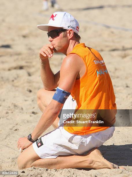 Julius Brink ponders defeat during the final match against Eric Koreng and David Klemperer during the men's final of the German Smart beach...