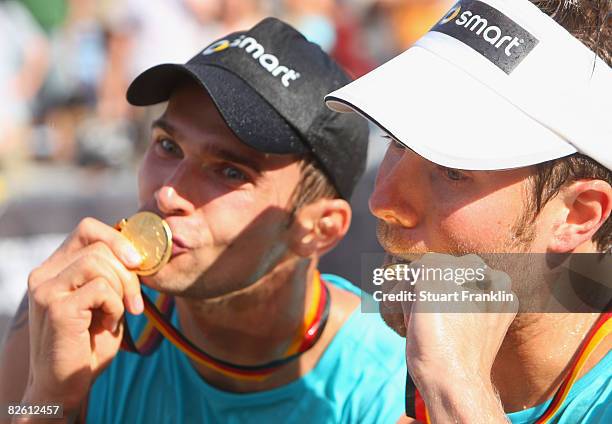 Eric Koreng and David Klemperer celebrate winning the final match against Julius Brink and Christoph Diekmann during the men's final of the German...