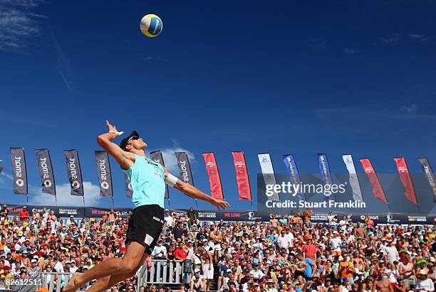 Eric Koreng serves during the final match against Julius Brink and Christoph Diekmann during the men's final of the German Smart beach volleyball...