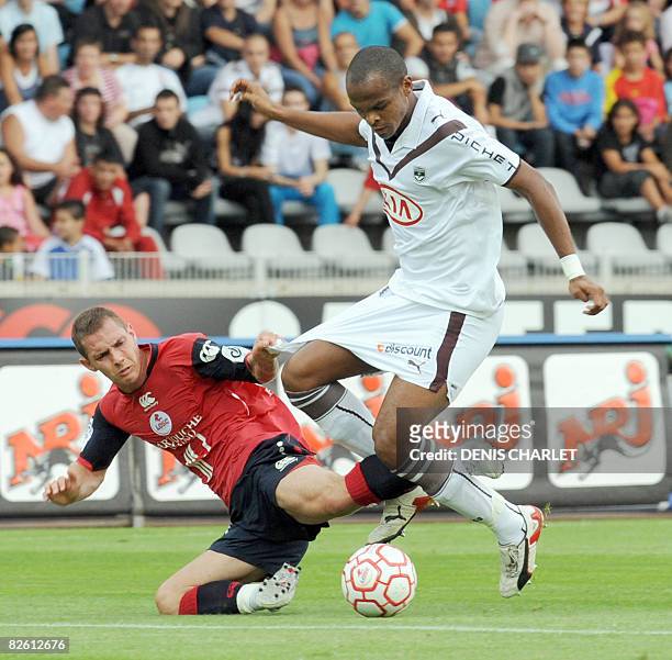Lille's French midfielder Ludovic Obraniak vies with Bordeaux' Senegalese defender Diawara Souleymane during the French L1 football match Lille vs....