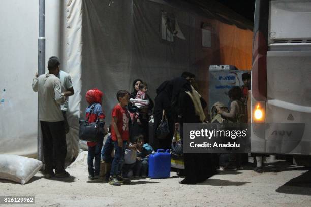 Syrian refugees return their homes after Ahrar al-Sham and Hezbollah announced a cease-fire, in Idlib, Syria on August 03, 2017. First batch of 7...