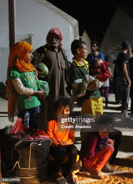 Syrian refugees return their homes after Ahrar al-Sham and Hezbollah announced a cease-fire, in Idlib, Syria on August 03, 2017. First batch of 7...