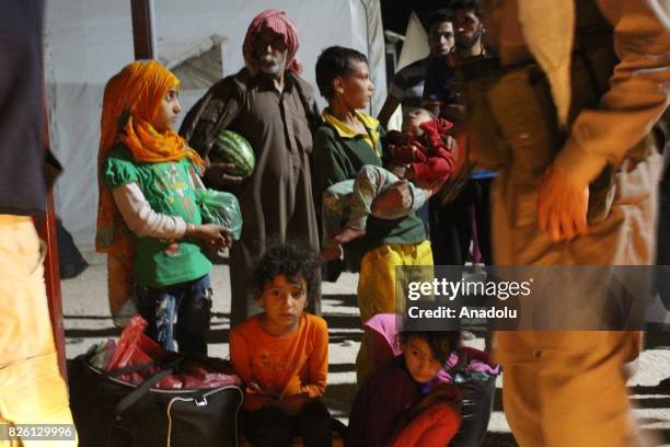 Syrian refugees return their homes after Ahrar al-Sham and Hezbollah announced a cease-fire, in Idlib, Syria on August 03, 2017. First batch of 7...
