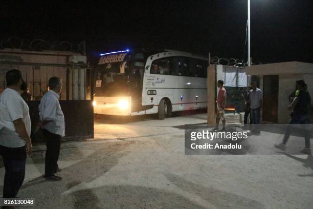Syrian refugees return their homes with a bus after Ahrar al-Sham and Hezbollah announced a cease-fire, in Idlib, Syria on August 03, 2017. First...