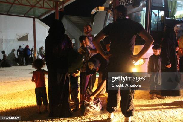 Syrian refugees return their homes after Ahrar al-Sham and Hezbollah announced a cease-fire, in Idlib, Syria on August 03, 2017. First batch of 7...