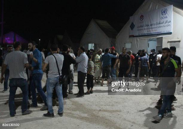 Syrian refugees return their homes after Ahrar al-Sham and Hezbollah announced a cease-fire, in Idlib, Syria on August 03, 2017. First batch of 7...