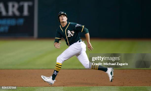 Jaycob Brugman of the Oakland Athletics runs the bases during the game against the Tampa Bay Rays at the Oakland Alameda Coliseum on July 17, 2017 in...