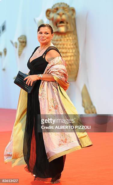 Italy's actress Serena Grandi poses before the screening of the movie "Il Papa Di Giovanna" during the 65th Venice International Film Festival at...