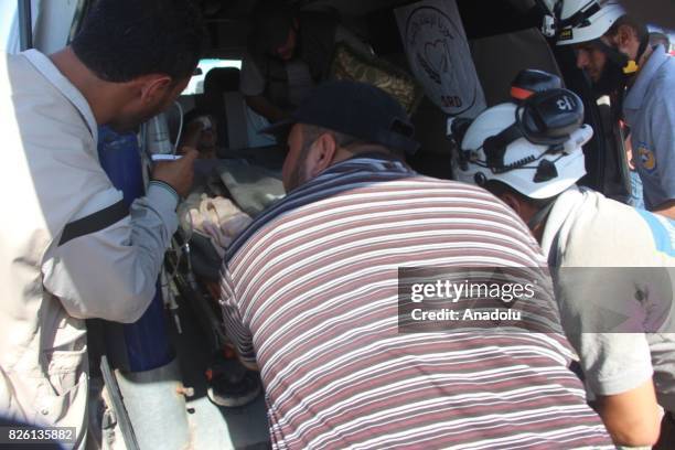 First group of Syrian refugees arrive, after a cease-fire announced between Hezbollah and Ahrar al-Sham, in Idlib, Syria on August 03, 2017. Convoy...