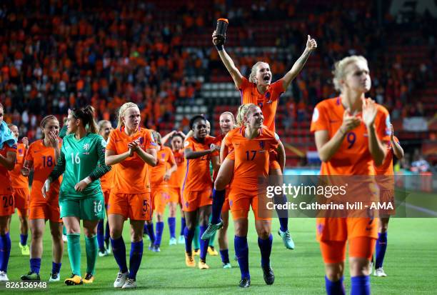 Desiree van Lunteren celebrates on the back of Kelly Zeeman of Netherlands Women after the UEFA Women's Euro 2017 semi final match between...