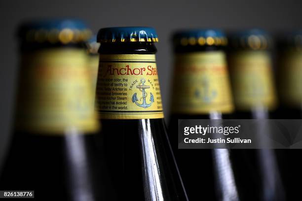 Bottles of Anchor Steam beer are displayed on August 3, 2017 in San Anselmo, California. San Francisco based Anchor Brewing announced plans to sell...