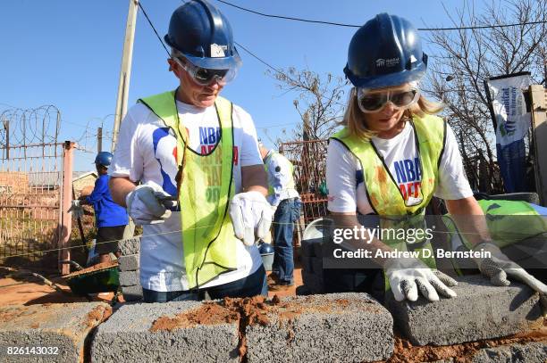 General Martin Dempsey and his wife during a NBA Cares and NBPA Foundation Service Project with Habitat for Humanity as part of the Basketball...