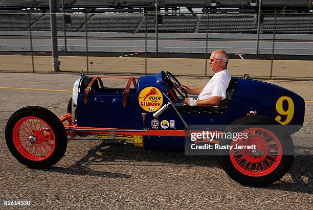 Vintage open wheel car warms the engine in the garage area during the Darlington Vintage Racing Festival at Darlington Raceway on August 31, 2008 in...