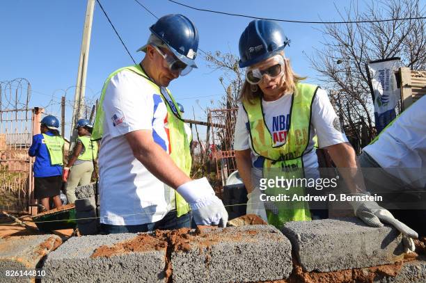 General Martin Dempsey and his wife during a NBA Cares and NBPA Foundation Service Project with Habitat for Humanity as part of the Basketball...