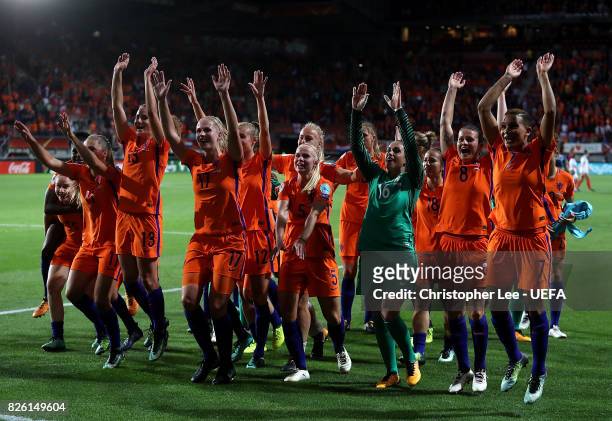Netherlands players celebrate at the final whistle during the UEFA Women's Euro 2017 Semi Final match between Netherlands and England at De Grolsch...