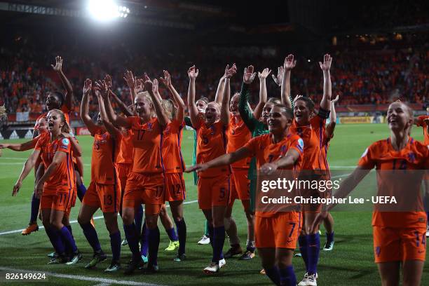 Netherlands players celebrate at the final whistle during the UEFA Women's Euro 2017 Semi Final match between Netherlands and England at De Grolsch...