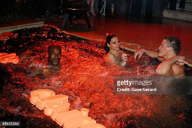 Model and Judge of TV Show "Make me a Super Model " Tyson Beckford and Designer Tali Jatali go wild and jump in the pool at the Marie Claire Fashion...