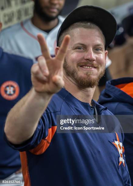 Houston Astros relief pitcher Chris Devenski gives a greeting from the dugout during the MLB game between the Tampa Bay Rays and Houston Astros on...