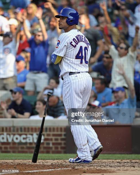 Willson Contreras of the Chicago Cubs follows the flight of his second home run of the game, a three run shot in the 6th inning, against the Arizona...