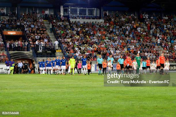 Both teams walk out before the UEFA Europa League Qualifier match between MFK Ruzomberok and Everton on August 3, 2017 in Ruzomberok, Slovakia.