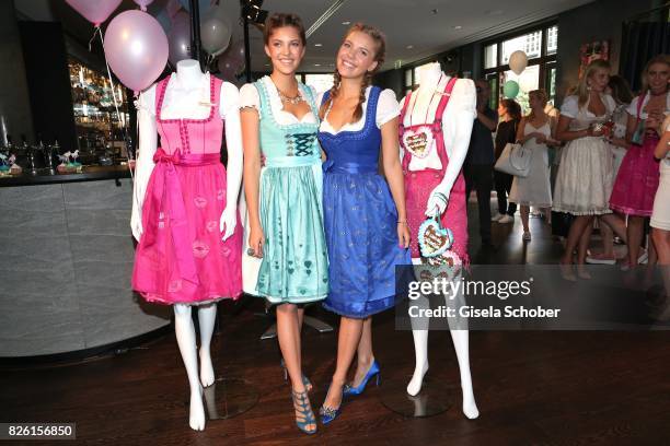 Paulina Swarovski and her sister Victoria Swarovski during the presentation of Victoria Swarovski's dirndl collection 'Candy Collection' by Krueger...