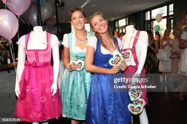 Paulina Swarovski and her sister Victoria Swarovski during the presentation of Victoria Swarovski's dirndl collection 'Candy Collection' by Krueger...